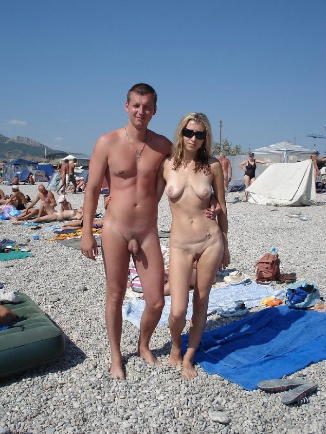 Amateur Nudists Posing at the Beach photo